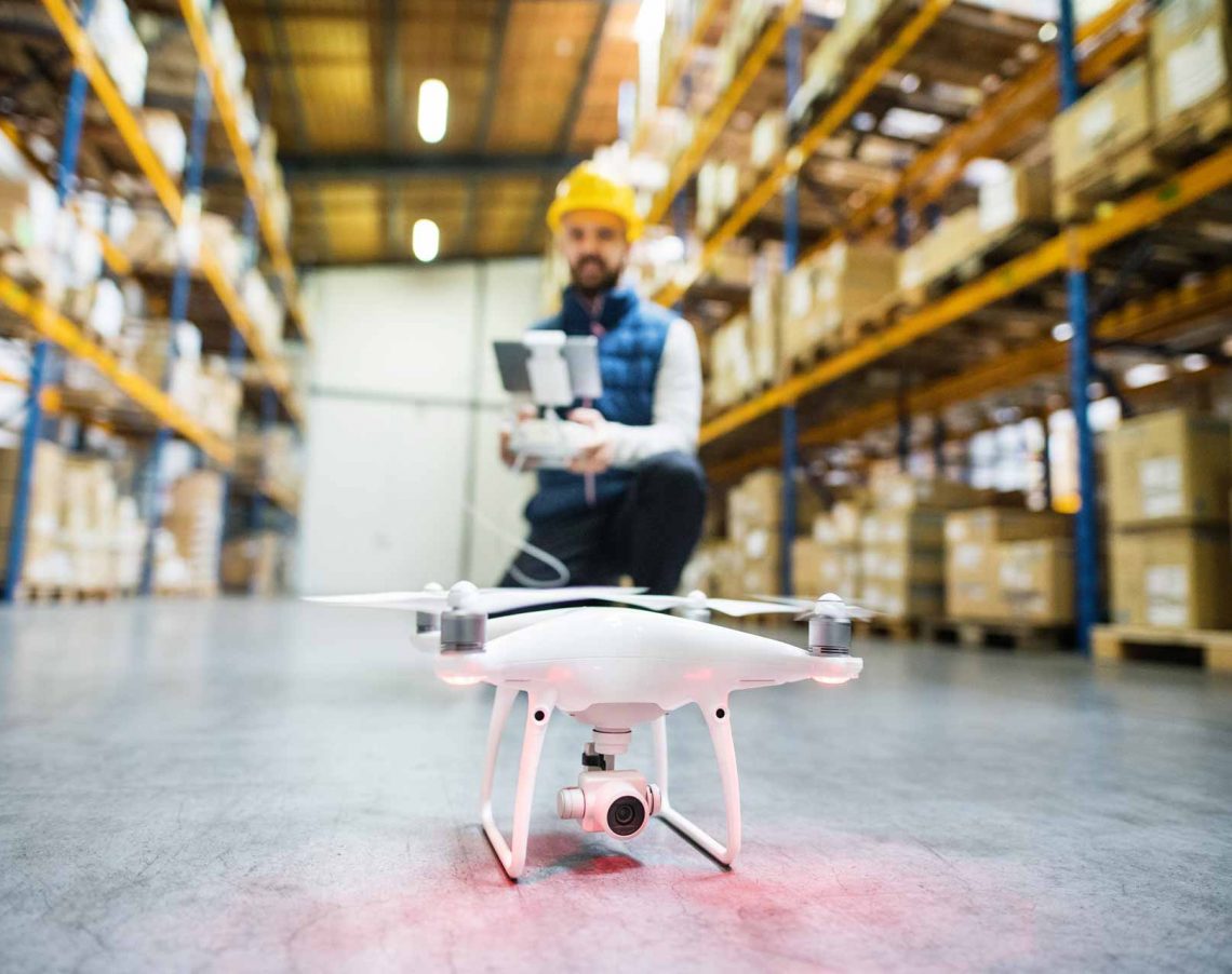 man-with-drone-in-a-warehouse-PMQEJ35.jpg man-with-drone-in-a-warehouse-PMQEJ35.jpg
